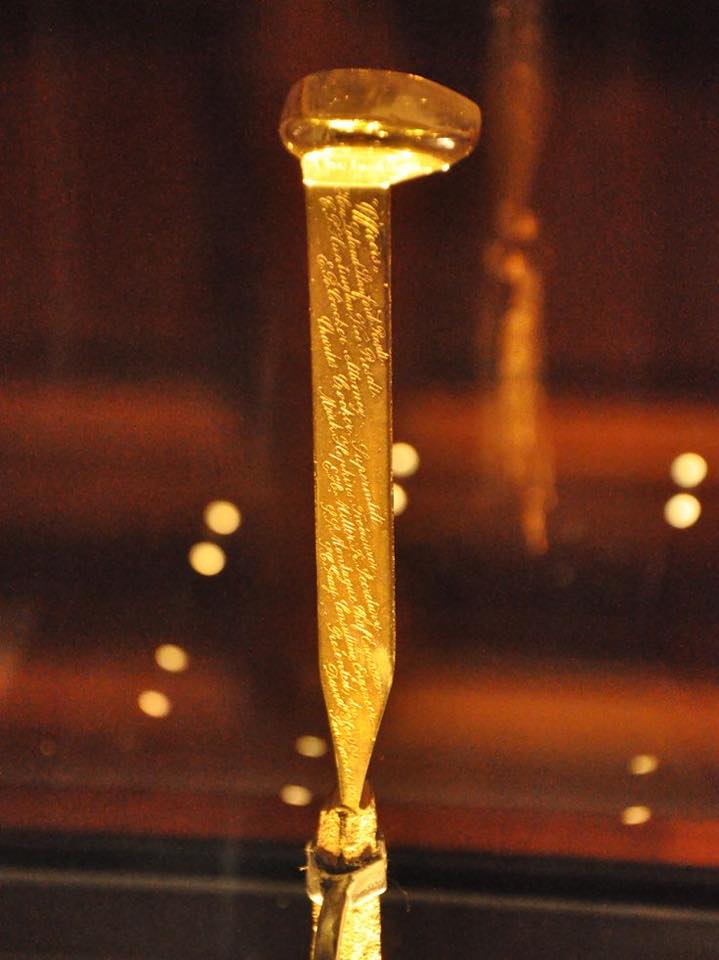 golden railway spike